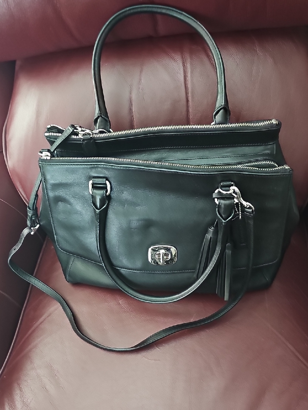 Classic Black Leather Tote Bag with Tassel Accent